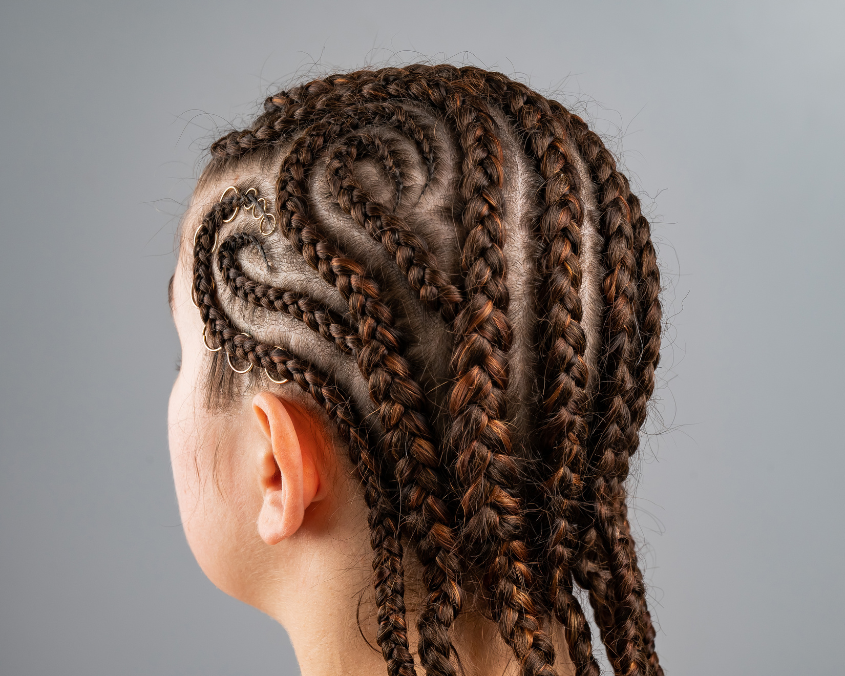 Close-up of braids on the head of a caucasian woman.